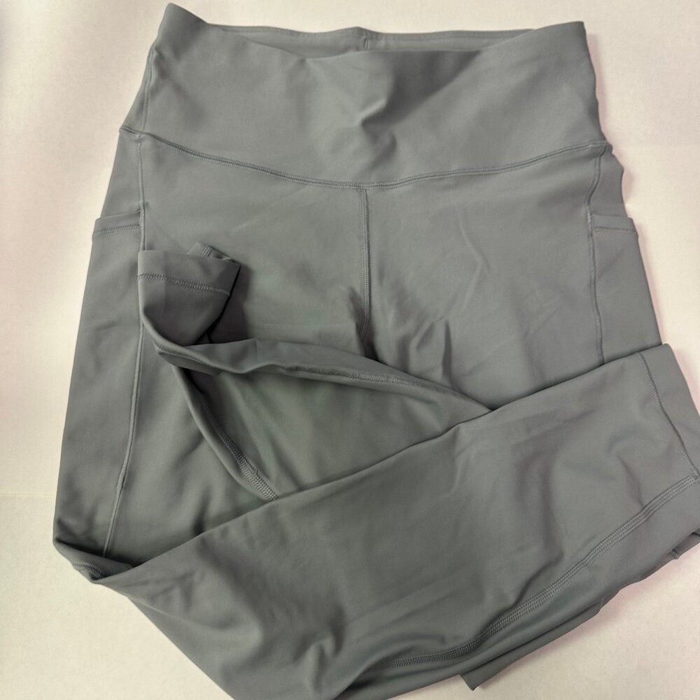 Athleta Interval Stash 7/8 Tight